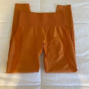 NVGTN orange contour leggings